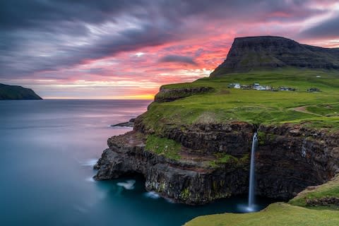 The Faroe Islands are a group of 18 mountainous islands - Credit: Andrea Comi/Andrea Comi