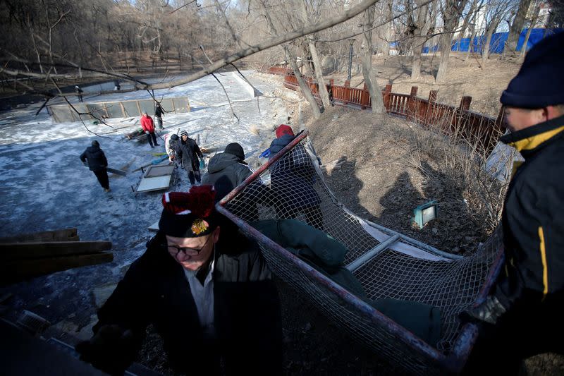 The Wider Image: On a frozen pond far from the Olympics, meet China's ice hockey veterans