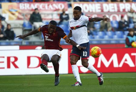 Football Soccer - AS Roma v Genoa - Italian Serie A - Olympic Stadium, Rome, Italy - 20/12/15. AS Roma's Antonio Rudiger (L) and Genoa's Serge Gakpe' in action. REUTERS/Tony Gentile