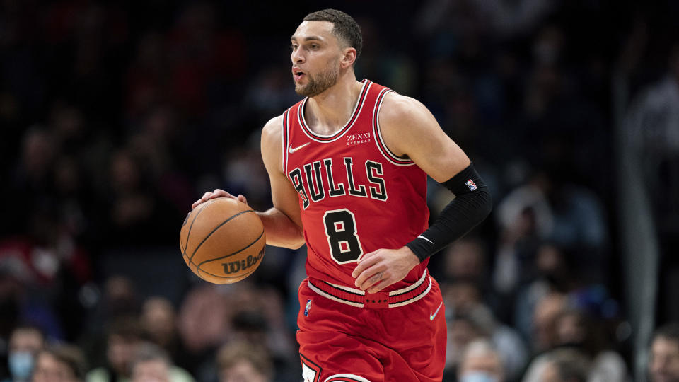 NBA Chicago Bulls guard Zach LaVine (8) brings the ball up court against the Charlotte Hornets during the first half of an NBA basketball game in Charlotte, N.C., Wednesday, Feb. 9, 2022. (AP Photo/Jacob Kupferman)