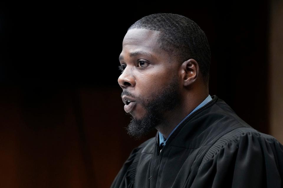 Judge Kwame Rowe presides over the sentencing hearing of Ethan Crumbley, Friday, Dec. 8, 2023, in Pontiac, Mich. Parents of students killed at Michigan's Oxford High School described the anguish of losing their children Friday as the judge considered whether Crumbley, a teenager, will serve a life sentence for a mass shooting in 2021. Crumbley, 17, could be locked up with no chance for parole for killing four fellow students and wounding others.