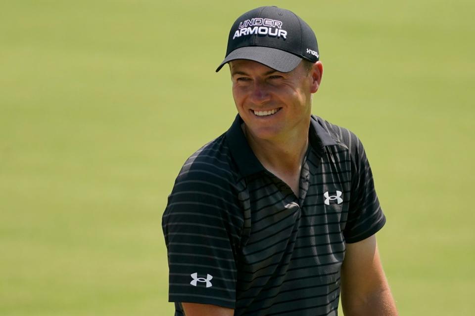 Jordan Spieth smiles on the driving range at the PGA Championship Wednesday in Tulsa.