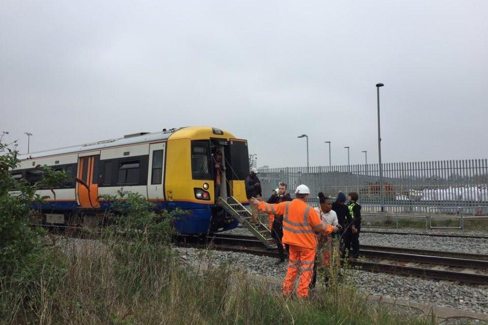 Evacuation: Passengers were freed after more than an hour and taken onto the tracks. (Joe Sparks)
