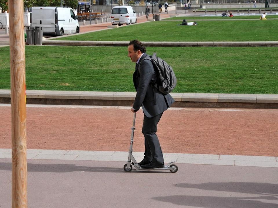 businessman scooter