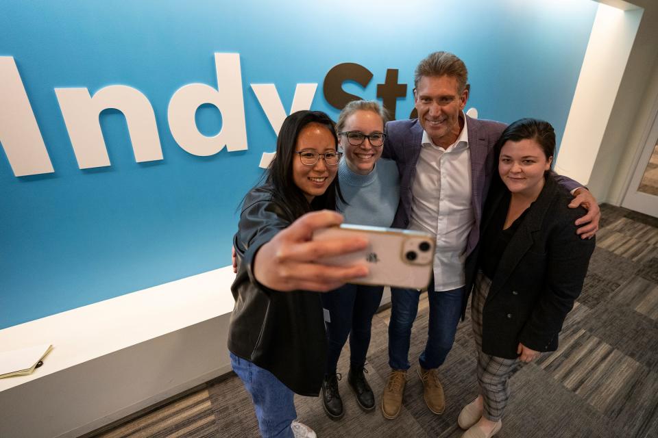 Gerry Turner, the star of ABC reality television series "The Golden Bachelor," takes a selfie with reporters, from left, Ko Lyn Cheang, Kayla Dwyer and Rachel Fradette on Monday, Nov. 13, 2023, in Indianapolis.