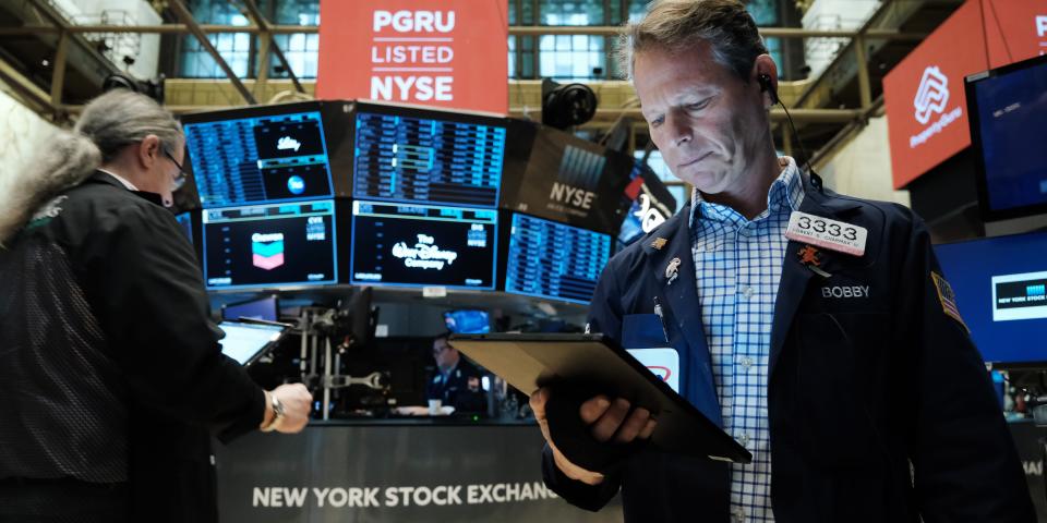 Traders work on the floor of the New York Stock Exchange (NYSE) on March 18, 2022 in New York City.