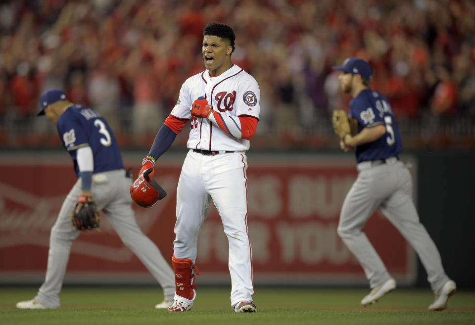 WASHINGTON, DC - OCTOBER 1: Washington Nationals left fielder Juan Soto (22) celebrates his game winning hit after getting tagged out for the 3rd out in the 8th inning  during the Washington Nationals defeat of  the Milwaukee Brewers 4-3 to win the wild card at Nationals Stadium in Washington, DC on October 1, 2019 . (Photo by John McDonnell/The Washington Post via Getty Images)