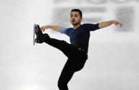 France's Kevin Aymoz competes in the men's free skating during the figure skating Grand Prix finals at the Palavela ice arena, in Turin, Italy, Saturday, Dec. 7, 2019. (AP Photo/Antonio Calanni)