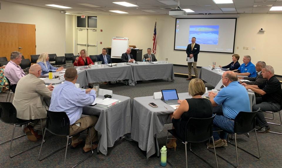 Facilitated by Thomas Lanahan, executive director of the Treasure Coast Regional Planning Council (standing), members of the Indian River County Commission and Sebastian City Council met together with their staffs at the North County Library in Sebastian Thursday Sept. 21, 2023.