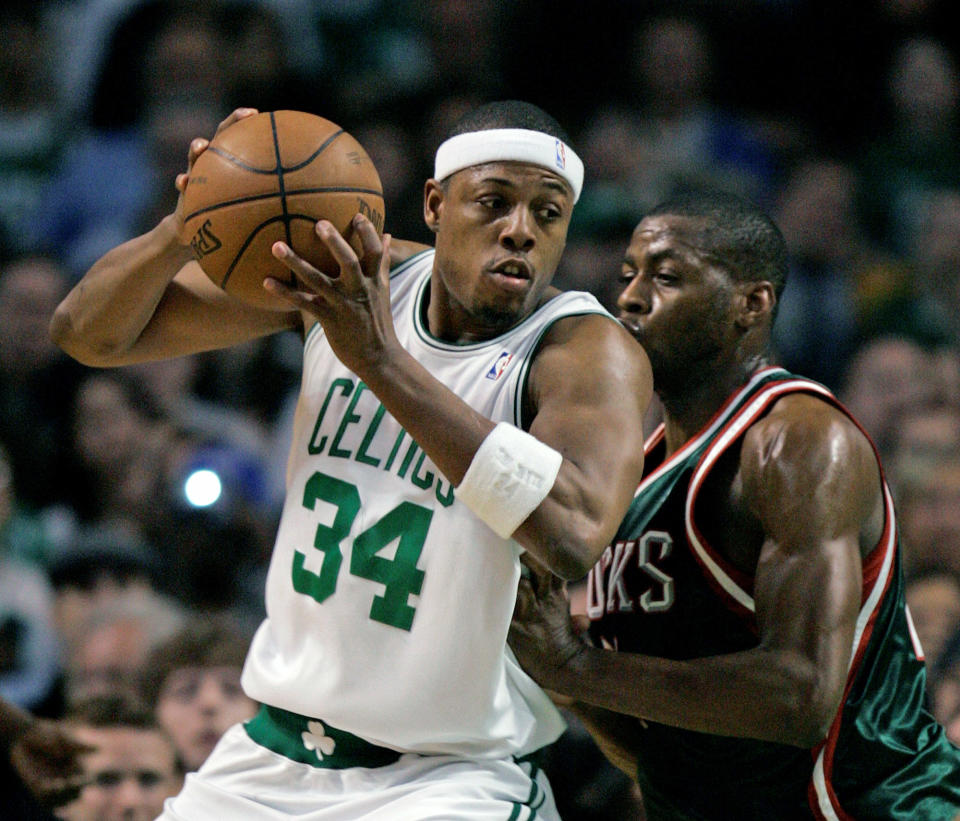 Boston Celtics’ Paul Pierce (34) looks to move against Milwaukee Bucks’ Desmond Mason, right, in the first quarter of an NBA basketball game, Friday, April 11, 2008, in Boston. (AP Photo/Michael Dwyer)