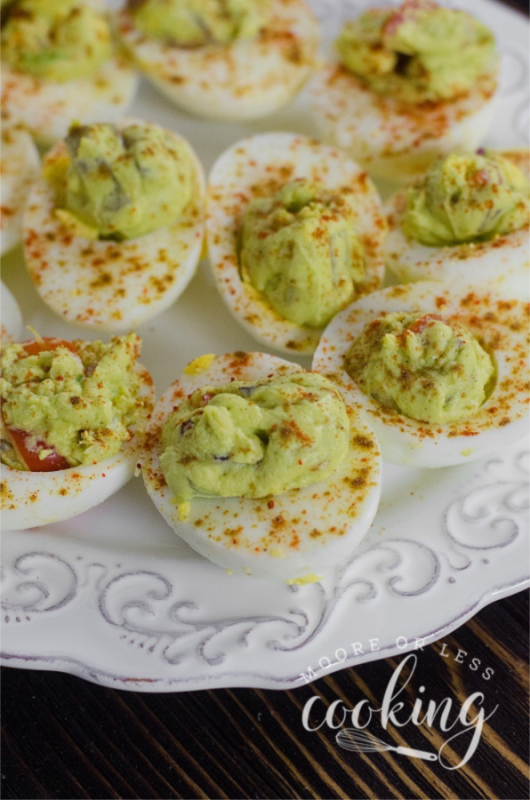 <p>Moore or Less Cooking</p><p>These melt-in-your-mouth morsels combine the richness of spice and avocado with an old-time favorite.</p><p><strong>Get the recipe: </strong><a href="https://mooreorlesscooking.com/guacamole-deviled-eggs/" rel="nofollow noopener" target="_blank" data-ylk="slk:Guacamole Deviled Eggs;elm:context_link;itc:0;sec:content-canvas" class="link "><strong>Guacamole Deviled Eggs</strong></a></p>