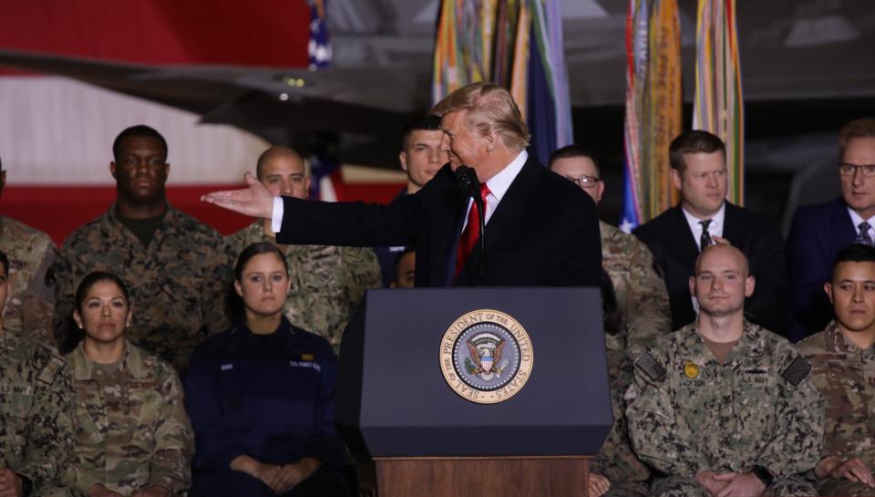 MARYLAND, USA - DECEMBER 20: U.S. President Donald Trump makes a speech as he attends a signing ceremony at Joint Base Andrews, in Maryland, United States on December 20, 2019. U.S. President Donald Trump signed into law Friday the 2020 defense spending bill. The 2020 National Defense Authorization Act (NDAA) authorizes a top-line budget of $738 billion, which includes $635 billion for base Pentagon spending, $23.1 billion for Energy Department nuclear weapons programs, $71.5 billion for war operations and $5.3 billion for emergency disaster recovery for military bases.  (Photo by Yasin Ozturk/Anadolu Agency via Getty Images)