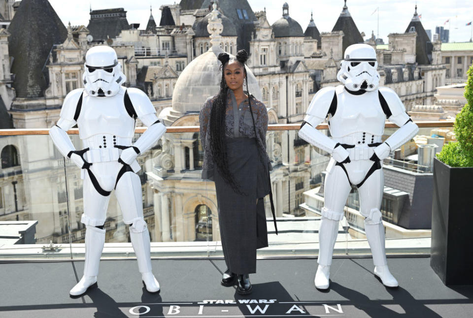 Moses at a Star Wars event, standing between two stormtroopers in full costume