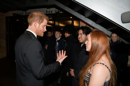 Prince Harry talks with guests, as he meets the CTBF trustees and representatives from Save The Children and Shelterbox during the European premiere of Star Wars: The Last Jedi, at the Royal Albert Hall in London, Britain December 12, 2017. REUTERS/John Stillwell/Pool