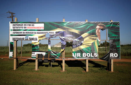 A billboard in support of Federal deputy Jair Bolsonaro, a pre-candidate for Brazil's presidential elections, is seen in Campo Novo do Parecis, Brazil April 27, 2018. Picture taken April 27, 2018. REUTERS/Ueslei Marcelino