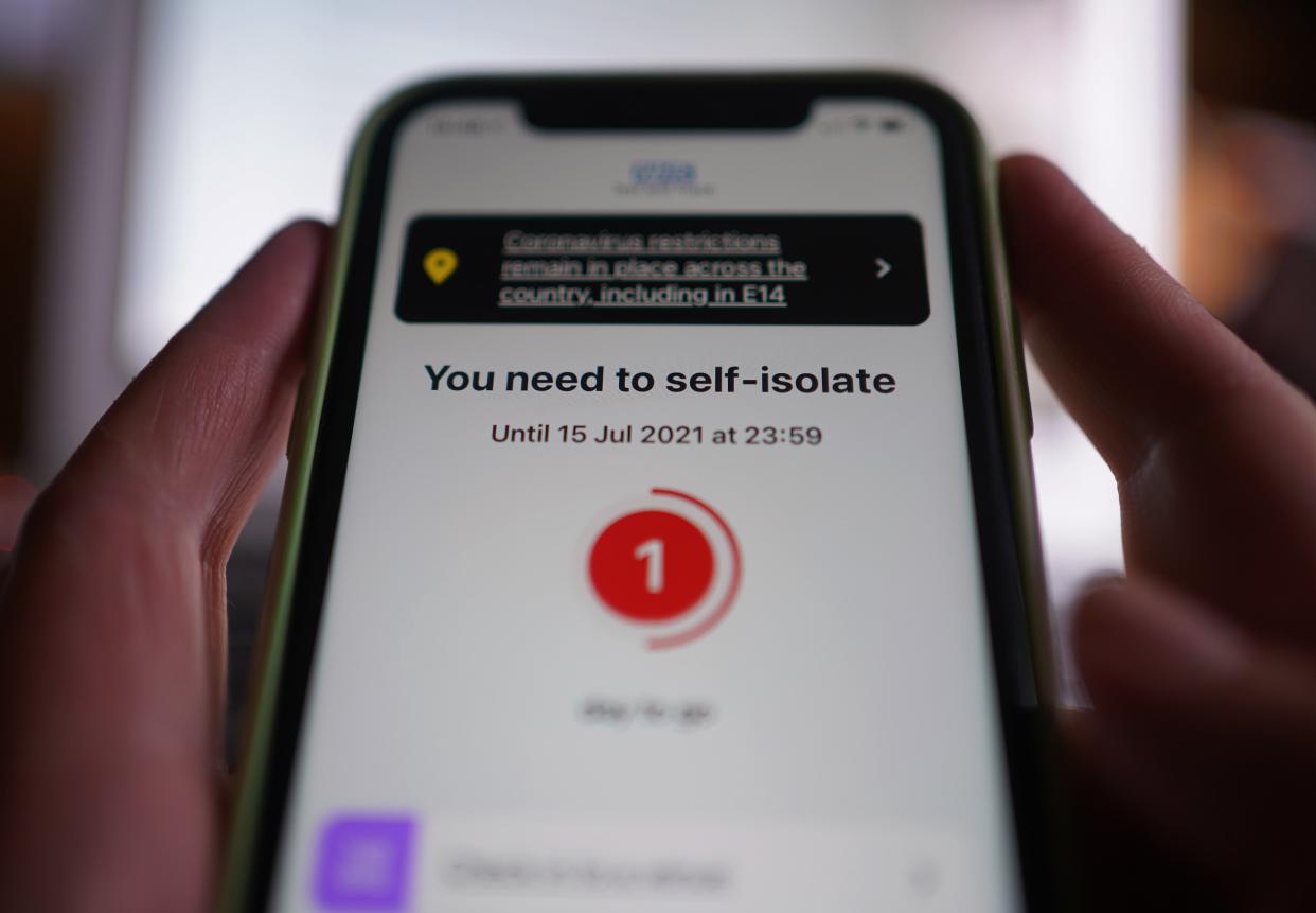 A record number of alerts have been sent on by the Covid app in England and Wales telling people to isolate (PA) (PA Wire)