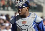 <p>Kansas City Royals catcher Salvador Perez, with a tribute to Miami Marlins pitcher Jose Fernandez on his pads, walks back from the mound during the third inning of a baseball game against the Detroit Tigers, Sunday, Sept. 25, 2016, in Detroit. (AP Photo/Carlos Osorio) </p>