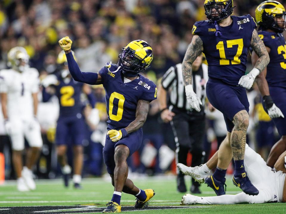 Michigan defensive back Mike Sainristil celebrates a play against Washington during the second half of the national championship game at NRG Stadium in Houston on Monday, Jan. 8, 2024.