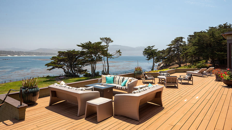 The home has plenty of outdoor living space with water views. - Credit: Photo: Sherman Chu/Sotheby’s International Realty