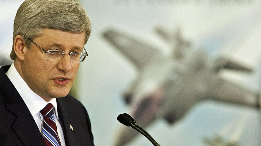 Prime Minister Stephen Harper speaks following a tour of F-35 fighter jet contractor Virtek Vision International in Waterloo, Ontario, Friday, March 11, 2011.