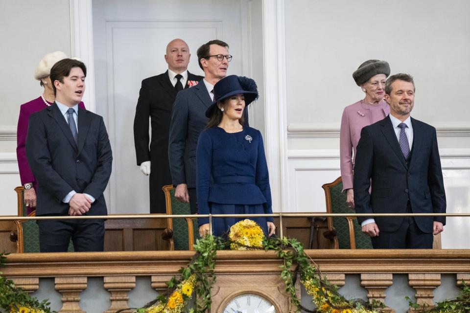 From front row left, Denmark's Crown Prince Christian, King Frederik X and Queen Mary, back row from left, Princess Benedikte, Prince Joachim and Queen Margrethe attend Folketingsalen, the Danish Parliament, at Christiansborg Castle, in Copenhagen, Monday, Jan. 2024. Denmark’s new King Frederik X has visited the Danish parliament on his first formal day on the job. His mother, Queen Margrethe, abdicated on Sunday after 52 years on the throne, the first Danish monarch to do so in nearly 900 years. (Ida Marie Odgaard/Ritzau Scanpix via AP)