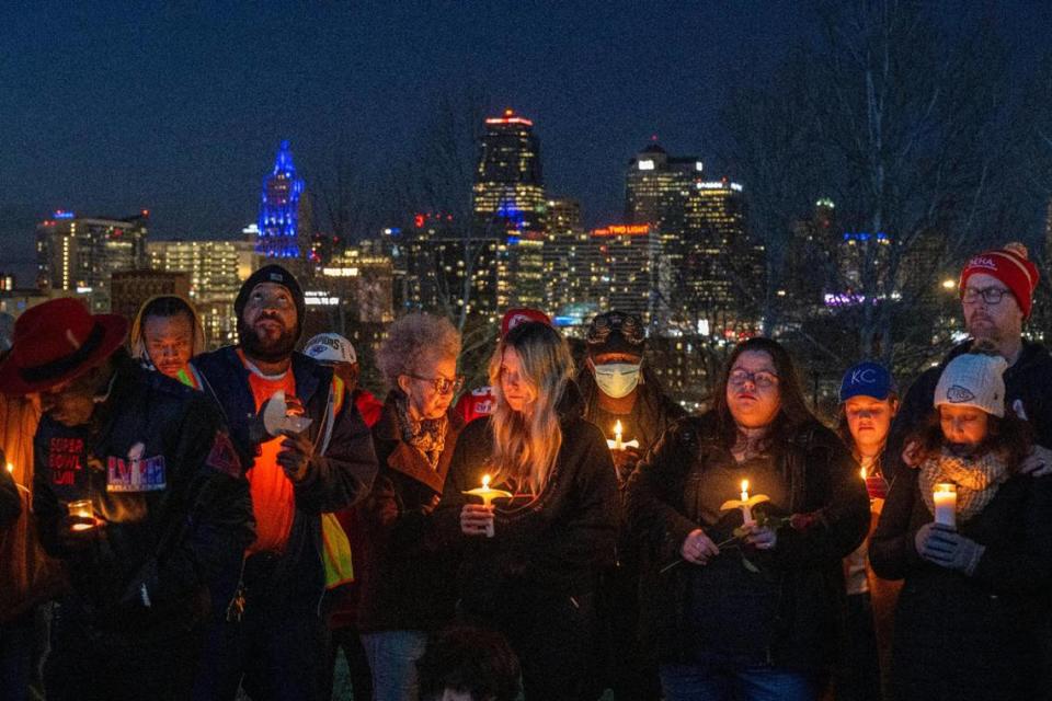 Members of the community gathered at Skywalk Memorial Park in Kansas City for a candlelight vigil Thursday, Feb. 15, 2024, to show support for the victims of the mass shooting, including Lisa Lopez-Galvan, who was killed in the shooting on Wednesday during the Chiefs Super Bowl rally.