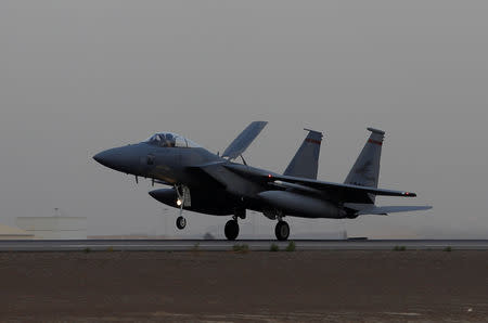 FILE PHOTO: A US Air Force F-15 lands after completing a regional exercise at a base in the Gulf, March 13, 2017. REUTERS/Hamad I Mohammed/File Photo