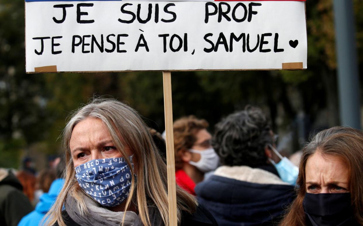 Tribute to Samuel Paty, the French teacher  beheaded on the streets of the Paris suburb of Conflans St Honorine, in Lille - PASCAL ROSSIGNOL/ REUTERS