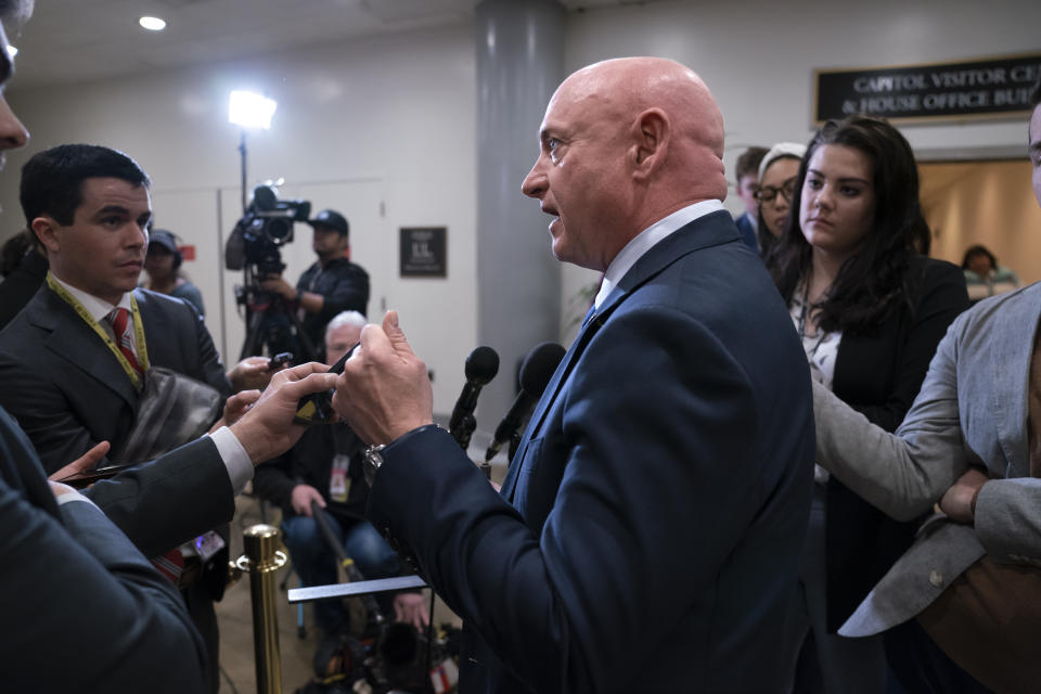 FILE - Sen. Mark Kelly, D-Ariz., speaks with reporters following a classified briefing on China, at the Capitol in Washington, Feb. 15, 2023. Senators are investigating how the suspected Chinese surveillance balloon was allowed to pass over crucial missile sites. Kelly is a former astronaut. He wants to require weather balloons to carry a radar transponder. (AP Photo/J. Scott Applewhite, File)