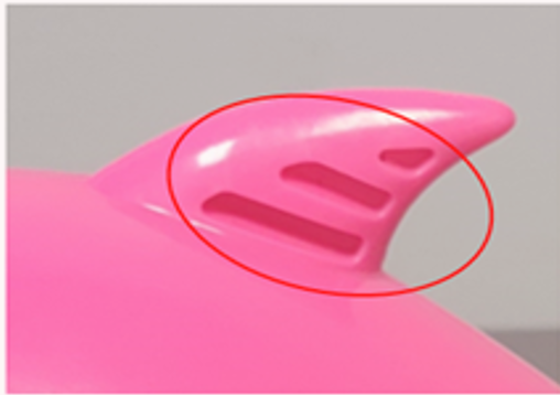 The recalled full-size toys have three grooves on one side of the hard plastic top fin. / Credit: United States Consumer Product Safety Commission