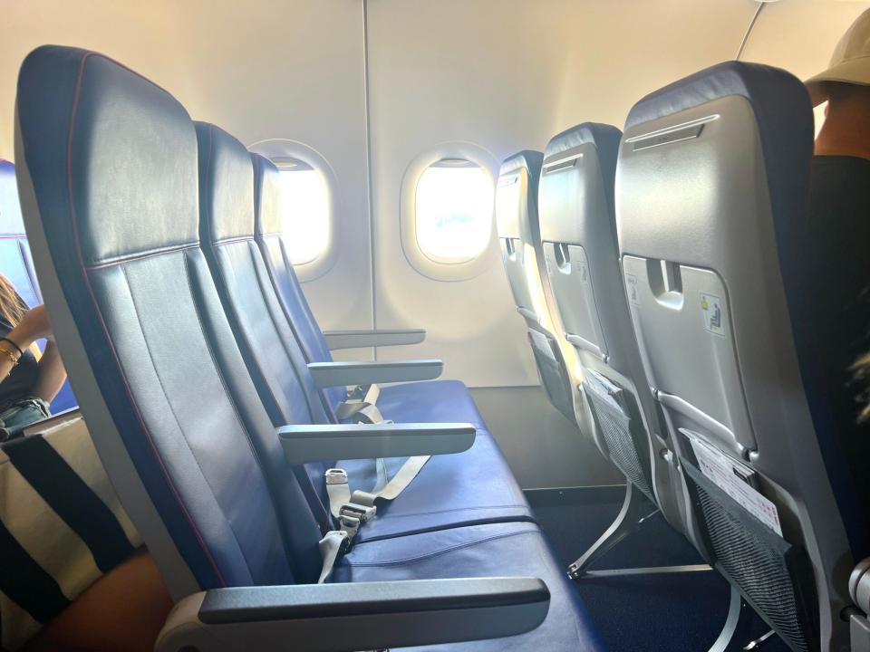 An empty row of seats on board a Wizz Air Airbus A321neo.