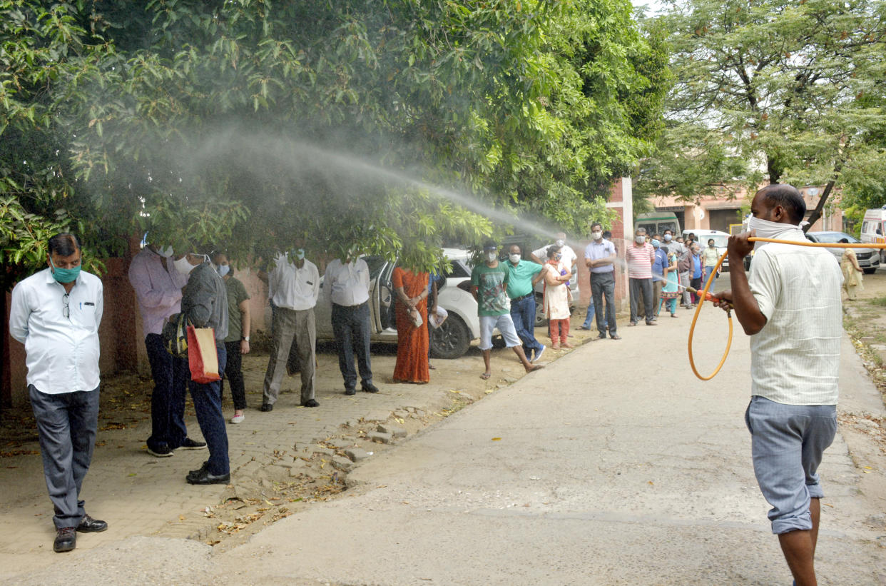 A worker spraying disinfectant Sanjay Nagar Ghaziabad, India