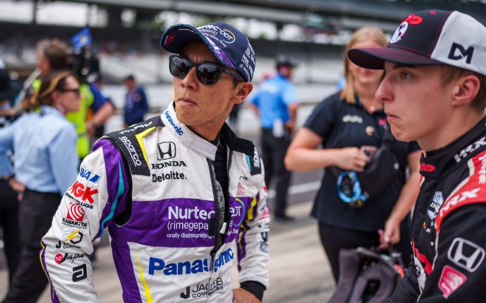 Dale Coyne Racing with Rick Ware Racing driver Takuma Sato (51) talks Dale Coyne Racing with HMD Motorsports driver David Malukas (18) on Saturday, May 21, 2022, during qualifying for the 106th running of the Indianapolis 500 at Indianapolis Motor Speedway.