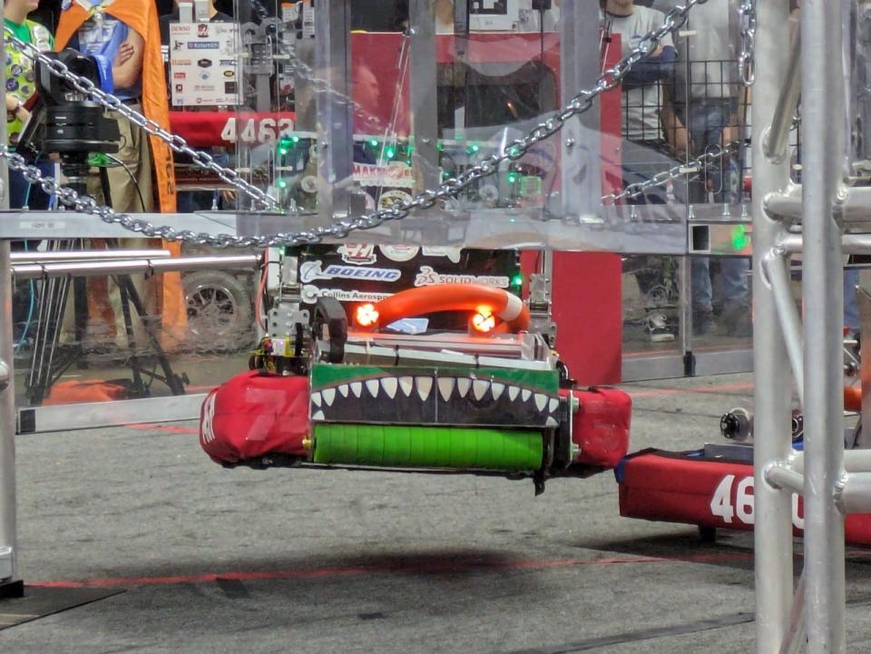 With nothing but mats separating them from the ice rink, the students and their home-brew robots competed in set strategic competitions for a chance to make it to an international championship.