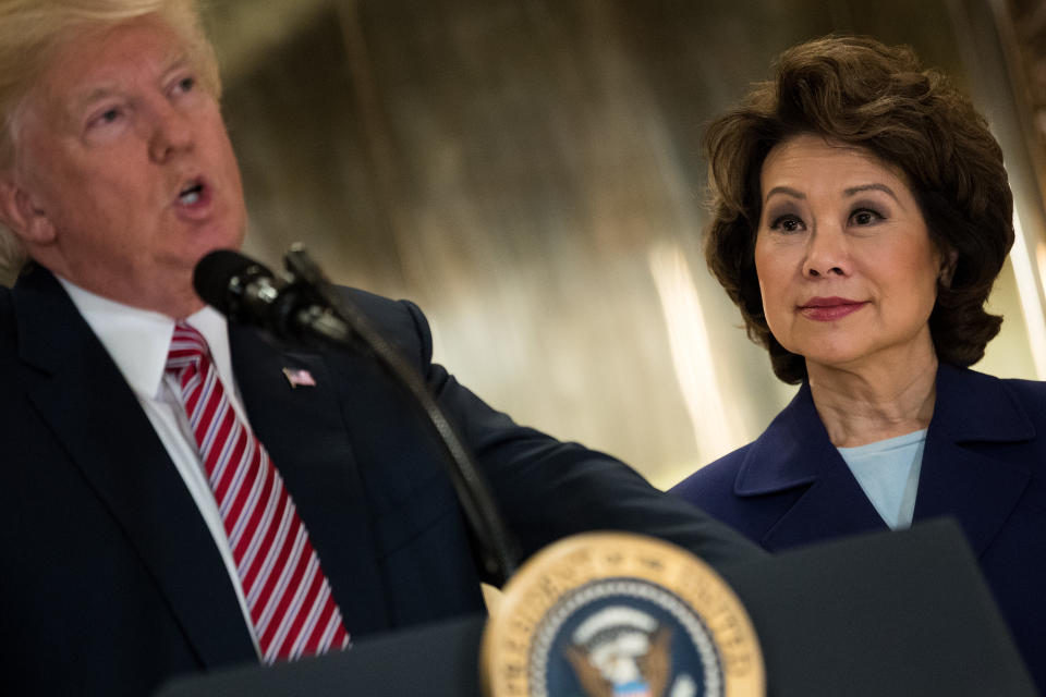 Mitch McConnell’s wife, Transportation Secretary Elaine Chao, looks on as President Donald Trump speaks at Trump Tower on Tuesday. (Photo: Drew Angerer/Getty Images)