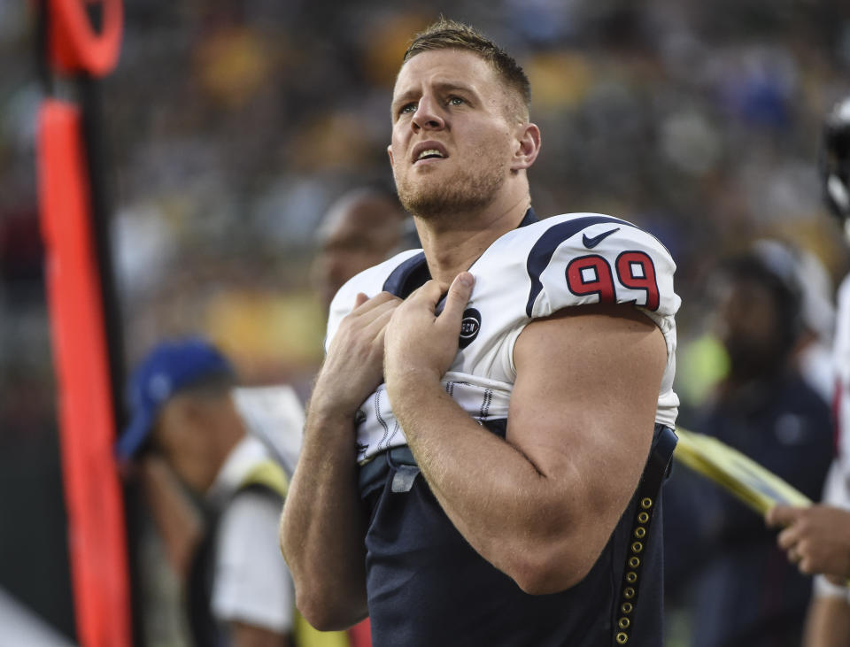 Aug 8, 2019; Green Bay, WI, USA;  Houston Texans defensive end J.J. Watt (99) watches the game against the Green Bay Packers from the sidelines at Lambeau Field. Mandatory Credit: Benny Sieu-USA TODAY Sports