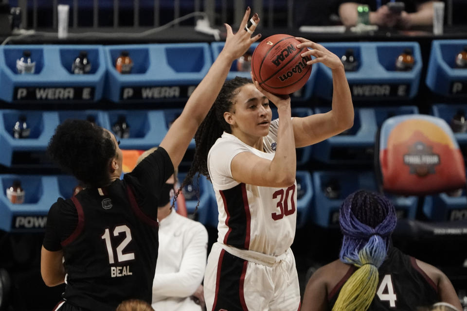 Stanford guard Haley Jones (30) shoots over South Carolina guard Brea Beal (12) during the second half of a women's Final Four NCAA college basketball tournament semifinal game Friday, April 2, 2021, at the Alamodome in San Antonio. (AP Photo/Morry Gash)