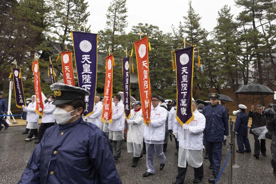 First well-wishers arrive at the Imperial Palace in Tokyo to greet the Emperor Naruhito's birthday Friday, Feb. 23, 2024. Naruhito turns 64 on Friday. (Stanislav Kogiku/Pool Photo via AP)