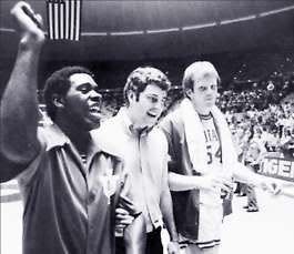 Indiana University players Quinn Buckner (left) and Kent Benson walk with coach Bob Knight after winning the 1976 NCAA championship in Philadelphia, the first of three NCAA titles for the Hoosiers under Knight.