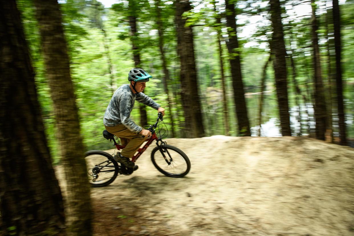 Russell James rides the new expansion of the Cape Fear Mountain Bike Trail on Wednesday, May 13, 2020.