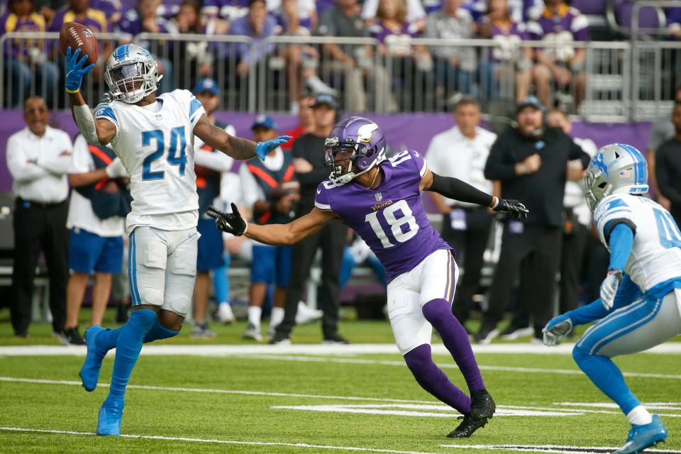 Lions cornerback Amani Oruwariye breaks up a pass intended for Vikings wide receiver Justin Jefferson during the first half on Sunday, Oct. 10, 2021, in Minneapolis.