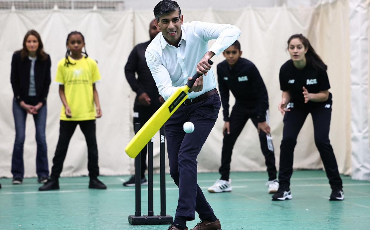 Britain's Prime Minister Rishi Sunak takes part in a cricket practice session