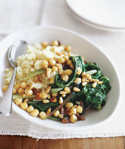 <p>Toasted pine nuts go a long way in providing flavor and texture to this sweet and savory dish. <br> <br> <strong>Get the recipe:</strong> <a rel="nofollow noopener" href="http://www.realsimple.com/food-recipes/browse-all-recipes/swiss-chard-chickpeas-couscous-10000001583602/index.html" target="_blank" data-ylk="slk:Swiss Chard With Chickpeas and Couscous;elm:context_link;itc:0;sec:content-canvas" class="link ">Swiss Chard With Chickpeas and Couscous</a></p>