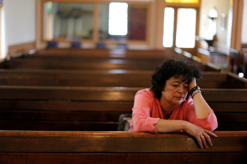 <p>Immigrant Rosa Sabido sits in the United Methodist Church in which she lives while facing deportation in Mancos, Colo., July 19, 2017. (Photo: Lucy Nicholson/Reuters) </p>