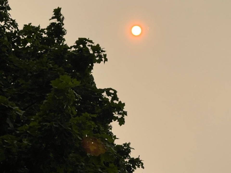 The sun gives off an orange glow through the haze brought on by the Canadian wildfires Wednesday, June 7, 2023.