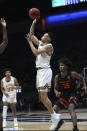 California's Jordan Shepherd (31) shoots against Oregon State's Glenn Taylor Jr. (35) during the second half of an NCAA college basketball game in Berkeley, Calif., Thursday, Dec. 2, 2021. (AP Photo/Jed Jacobsohn)