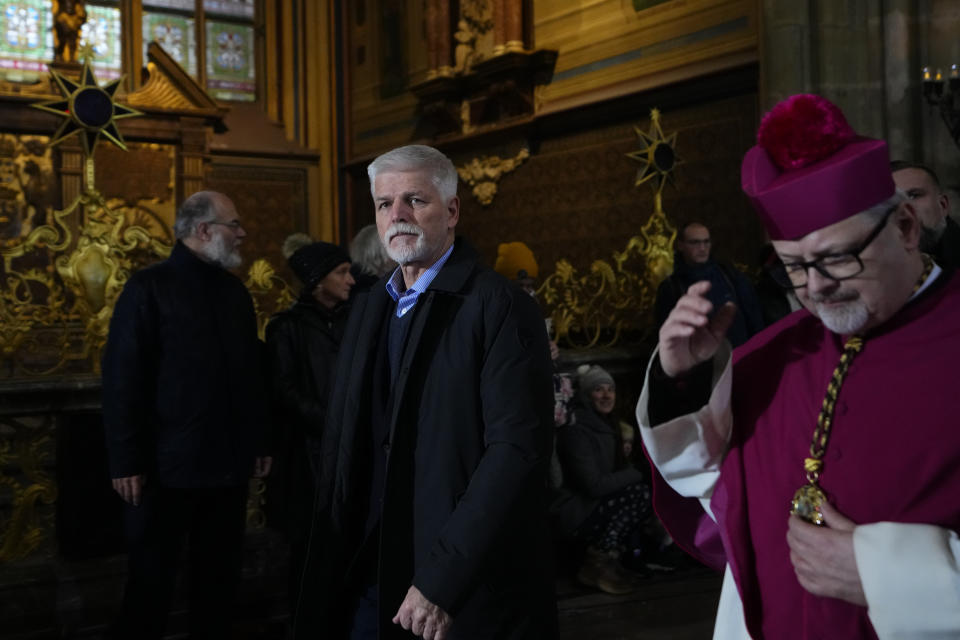 President of the Czech Republic Petr Pavel arrives for the memorial service for the victims of Philosophical Faculty of Charles University shooting in Prague, Czech Republic, Saturday, Dec. 23, 2023. Czech police are investigating why a student went on a dayslong violent rampage culminating in a shooting at the university he attended in Prague that left 14 dead and dozens wounded. (AP Photo/Petr David Josek)