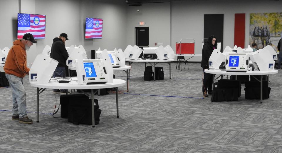 Voters cast ballots in Tuesday's primary election at the Coshocton County Commissioners Community Meeting Room, the polling location for all voters in the City of Coshocton.