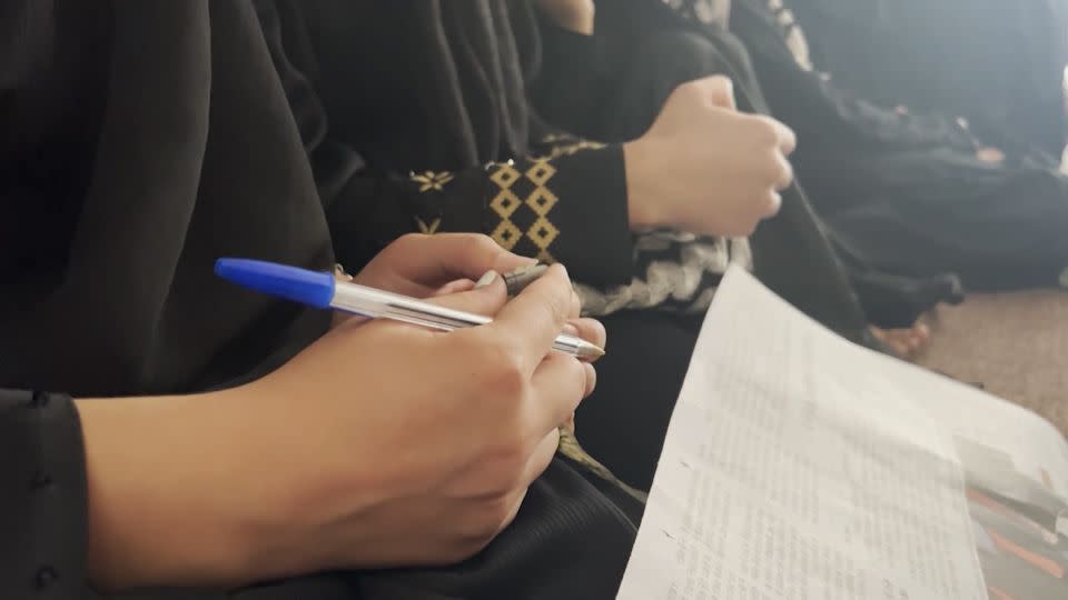 Girls attend class at the hidden school in Afghanistan. Subjects covered include math, science, English and tailoring. - CNN