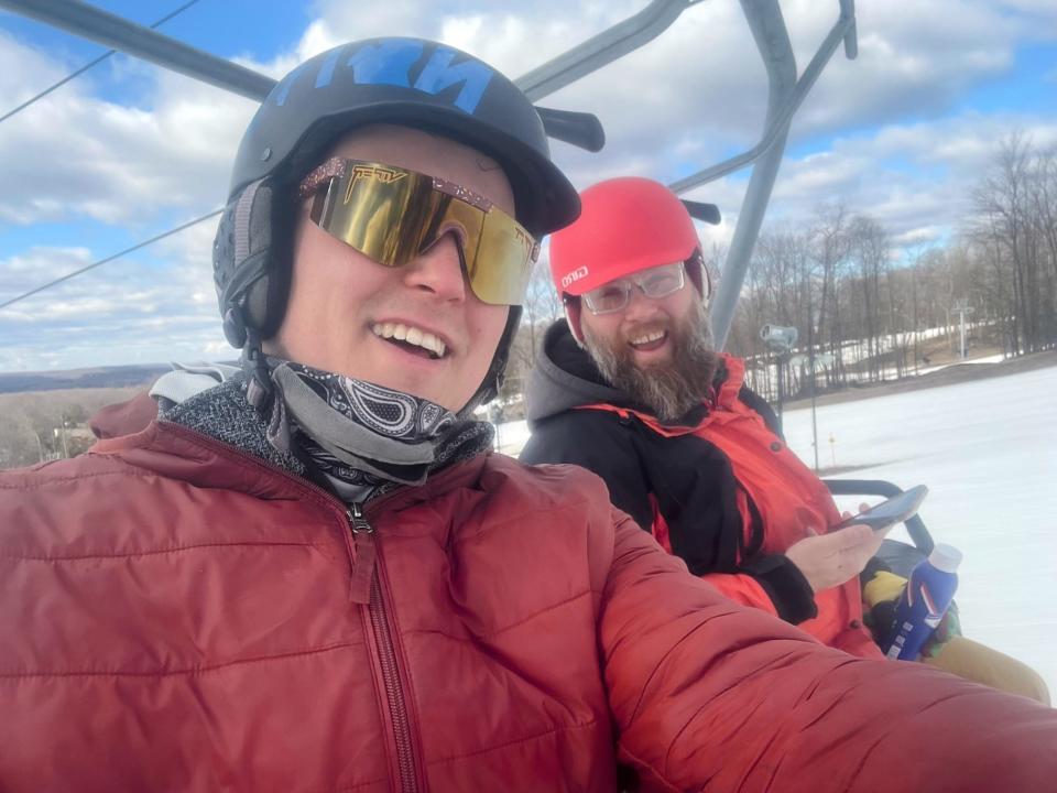 Travis Fleming and his brother Matthew Mercier took this photo together on March 28, 2024 on a Boyne Mountain ski lift. Shortly after the photo was taken, Fleming collided with the base of a ski lift and died from his injuries.